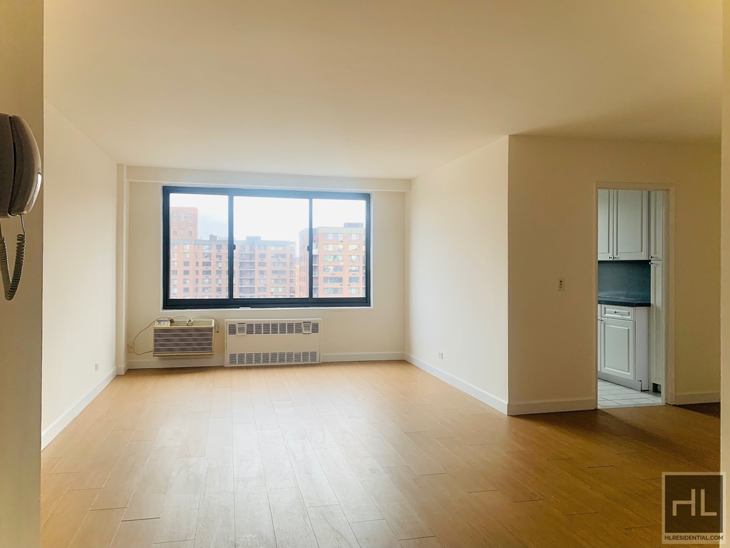 bright living room with large window