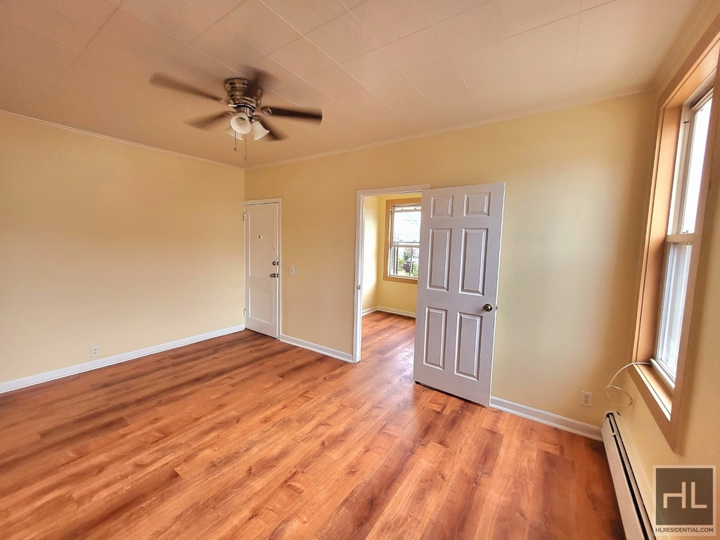 bright room with a ceiling fan