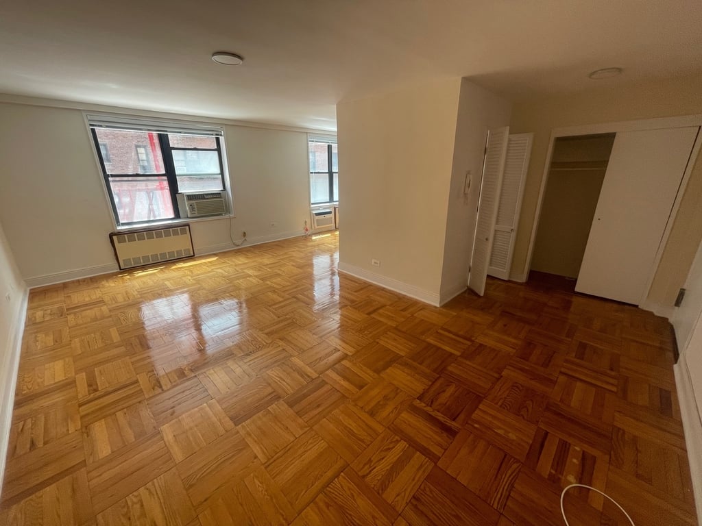 empty alcove studio with closet space