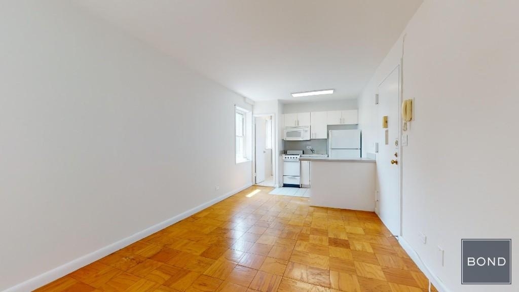 large studio with kitchen