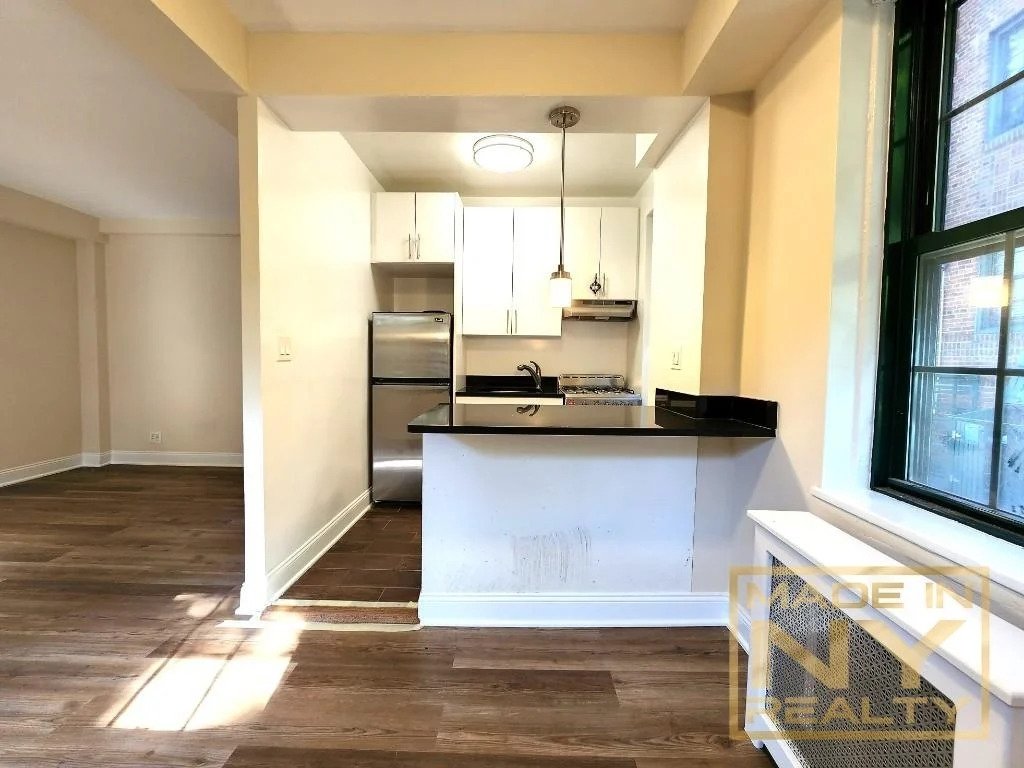 studio with modern kitchen area