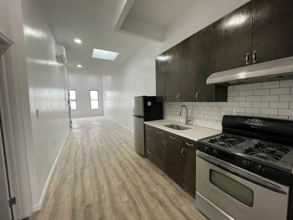 kitchen with dark cabinets