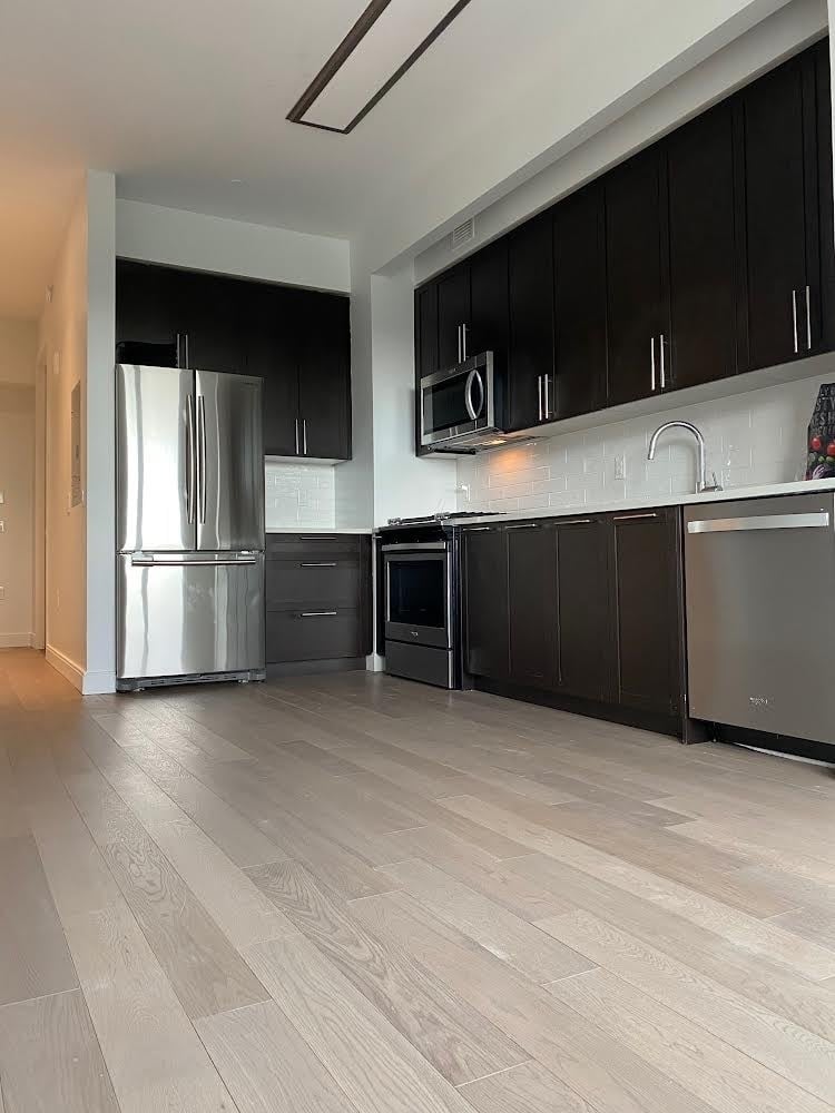 Kitchen with stainless steel appliances