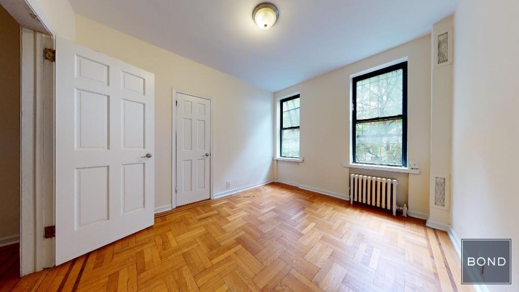 Bedroom with two windows