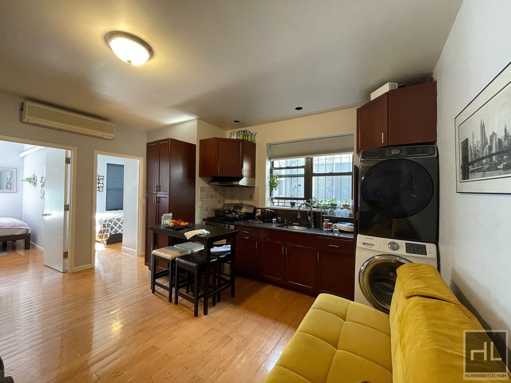 Large room with kitchen space