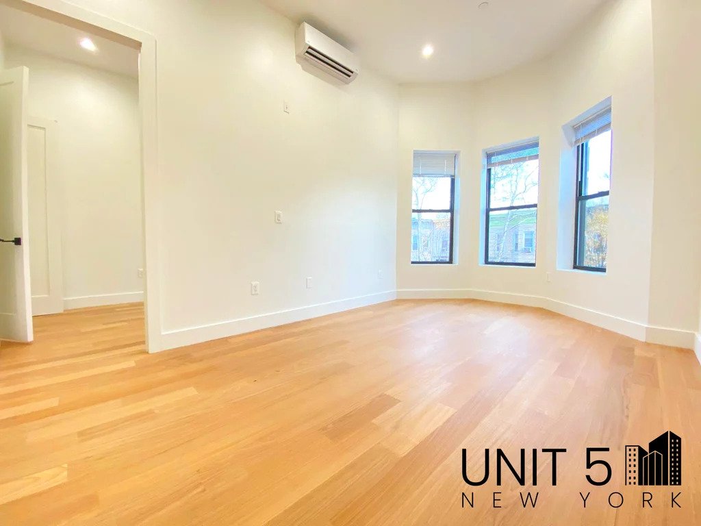 Living room with bay windows