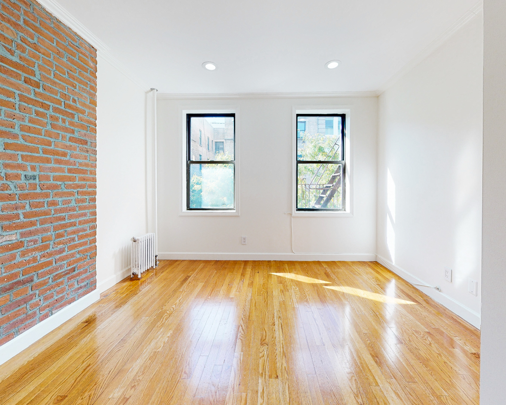 Bright room with exposed brick