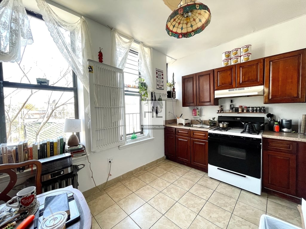 Kitchen with dark cabinets