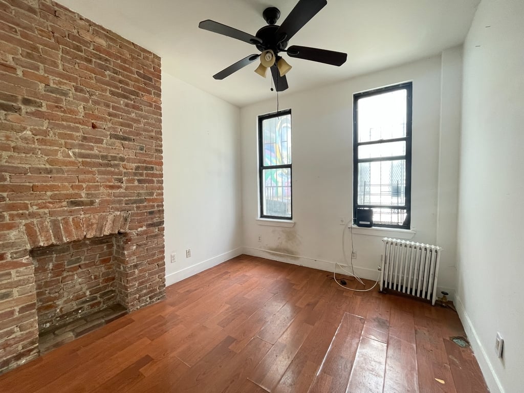 Living room with exposed brick