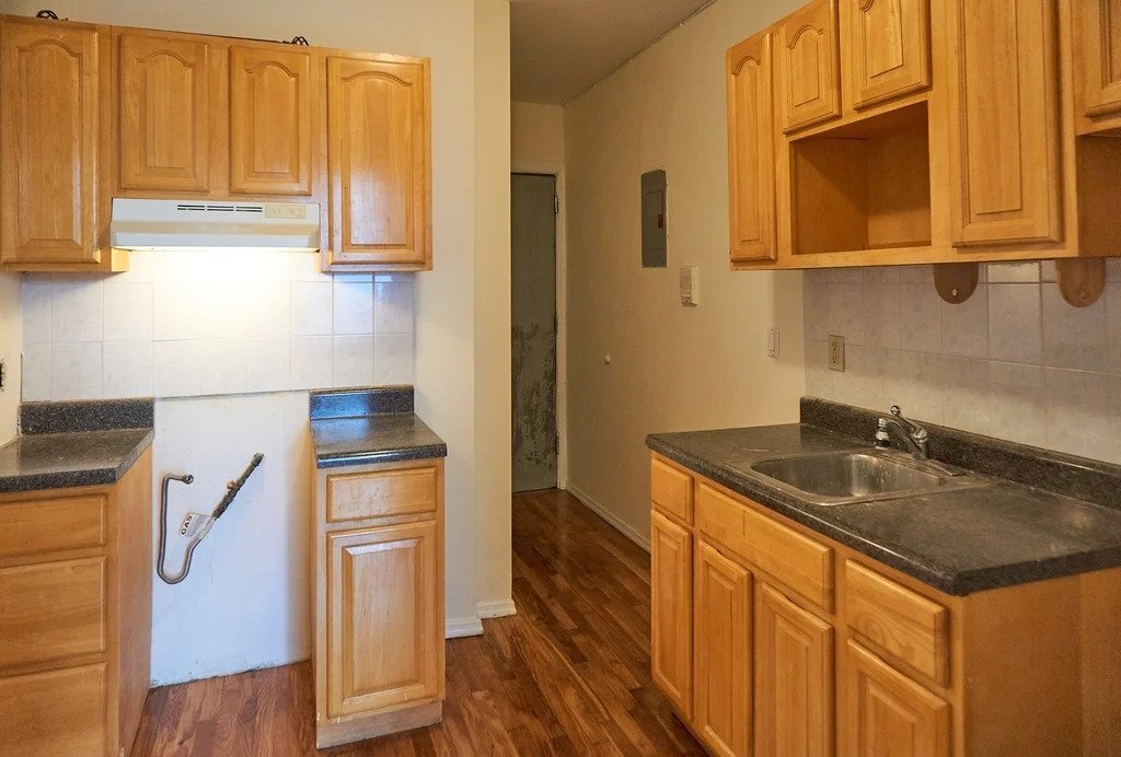 Kitchen with wooden cabinetry